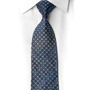 San-Dee navy blue geometric rhinestone silk necktie laid flat on white dress shirt showing full length and crystal sparkle detail
