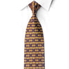 San-Dee rhinestone silk necktie in burgundy and gold harlequin diamond pattern laid flat on white shirt, showing full length and crystal rhinestone sparkles
