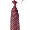 San-Dee men's 100% silk necktie in deep burgundy with all-over starburst medallion pattern and diagonal rows of hand-applied crystal rhinestones and silver sparkles, knotted on white dress shirt – front view