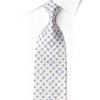 San-Dee white silk rhinestone necktie with silver geometric square-in-circle pattern and crystal sparkles worn on white dress shirt
