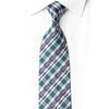 San-Dee RDC147 teal, navy and ivory plaid silk necktie with crystal rhinestone clusters, knotted against a white shirt.