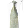 San-Dee sage green geometric rhinestone silk necktie worn with white dress shirt, showing full length and crystal yellow sparkle detail