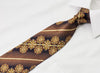 Odysseus Woven Silk Tie Golden Stripes & Medellions On Brown