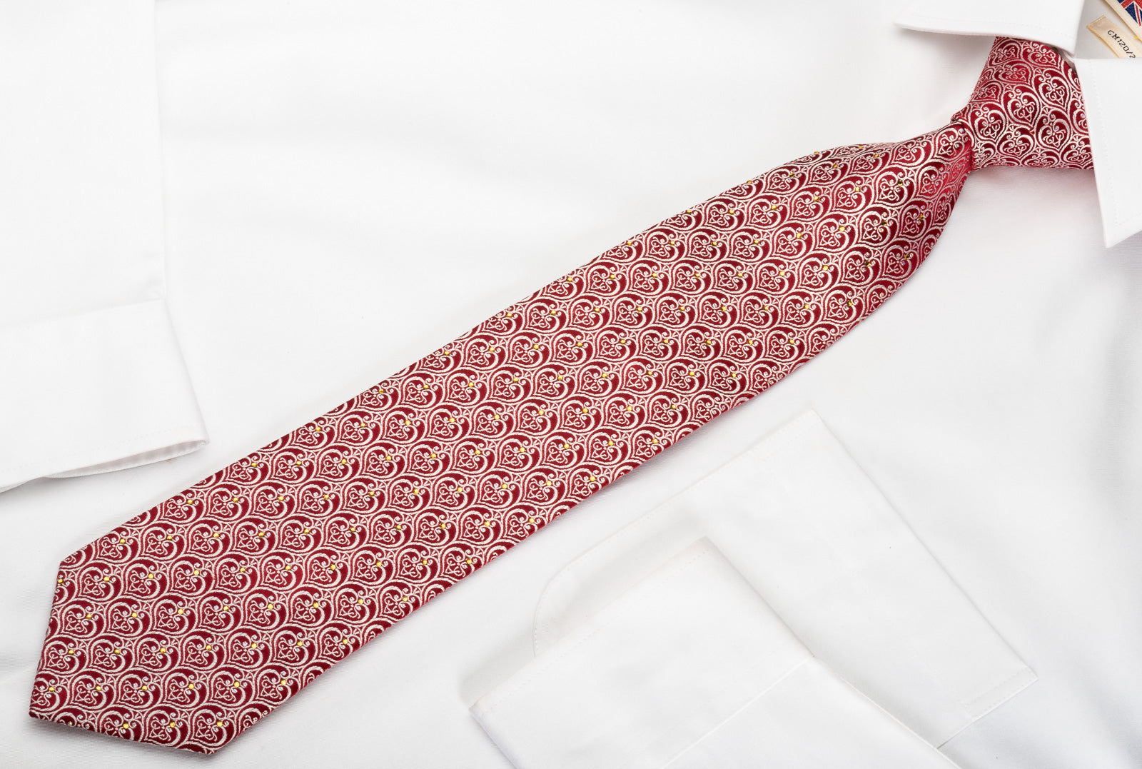 Silk tie with baroque pattern in noble red